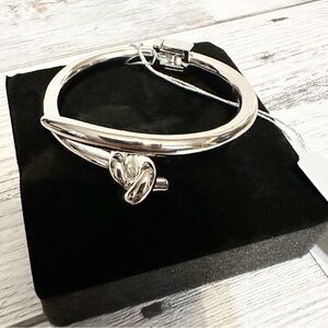 EyeCandy Los Angeles silvertone knot hinged bangle bracelet NWT